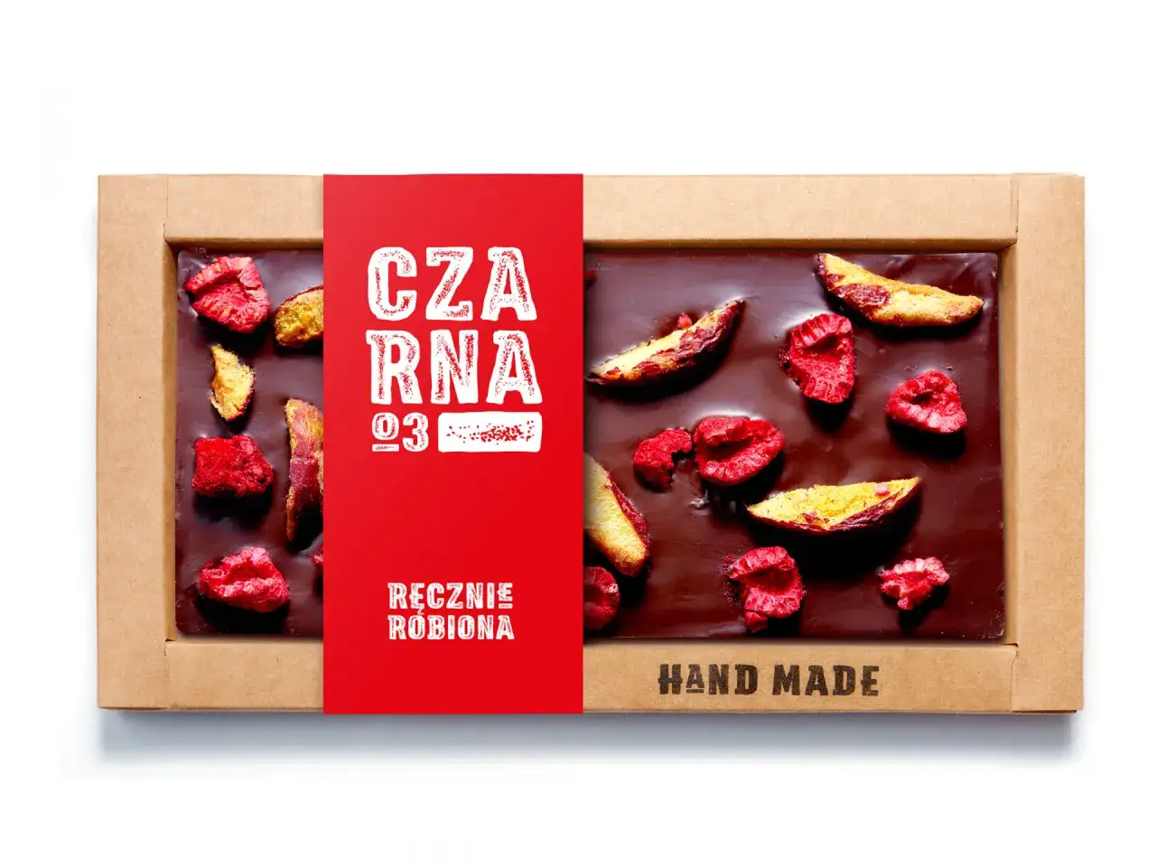 Czekolada deserowa jaka to? Ręcznie robiona, ciemna tabliczka z malinami i kawałkami mango.